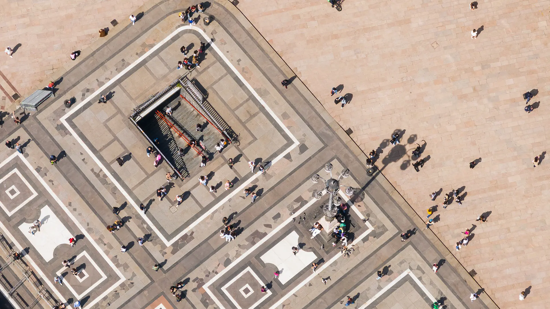 Aerial view of a square with architectural geometries